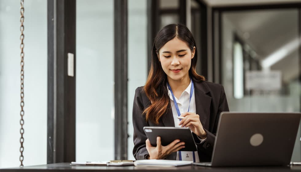 Woman views digital onboarding templates inside an applicant tracking system.